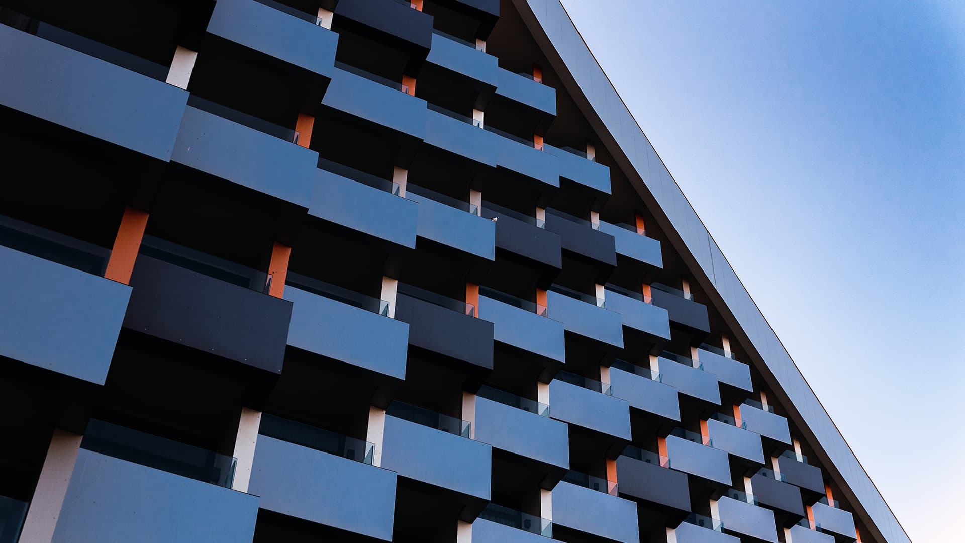 A modern looking building with rectangle shaped balconies
