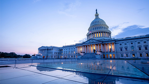 The US Capitol Building at dusk.