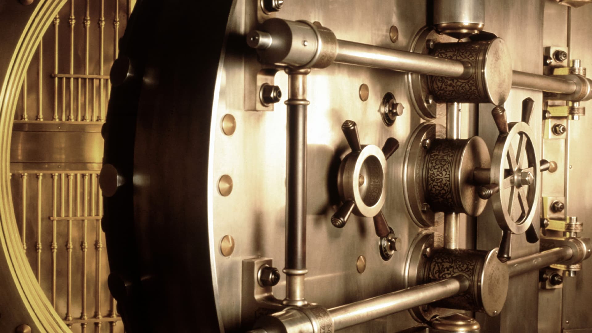 A gold vault that is slightly ajar