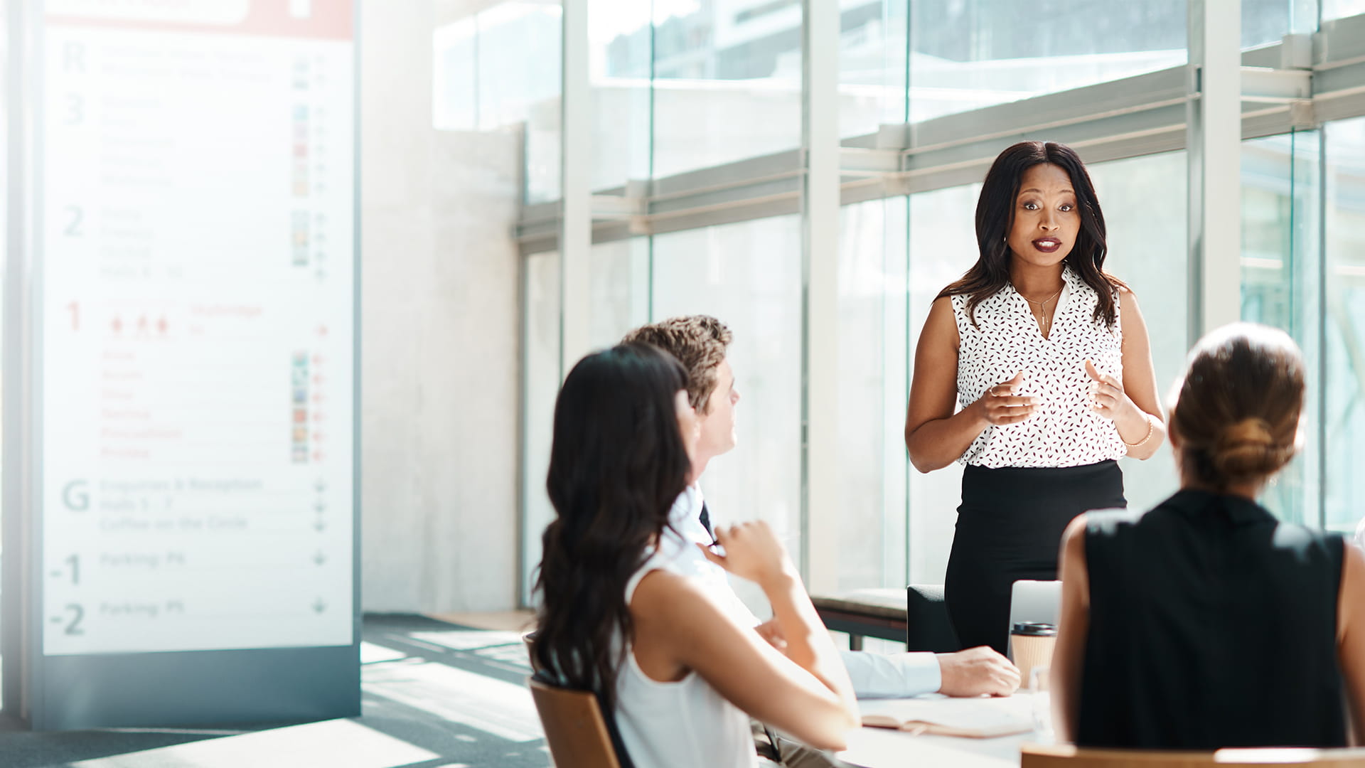 A woman leading a meeting.