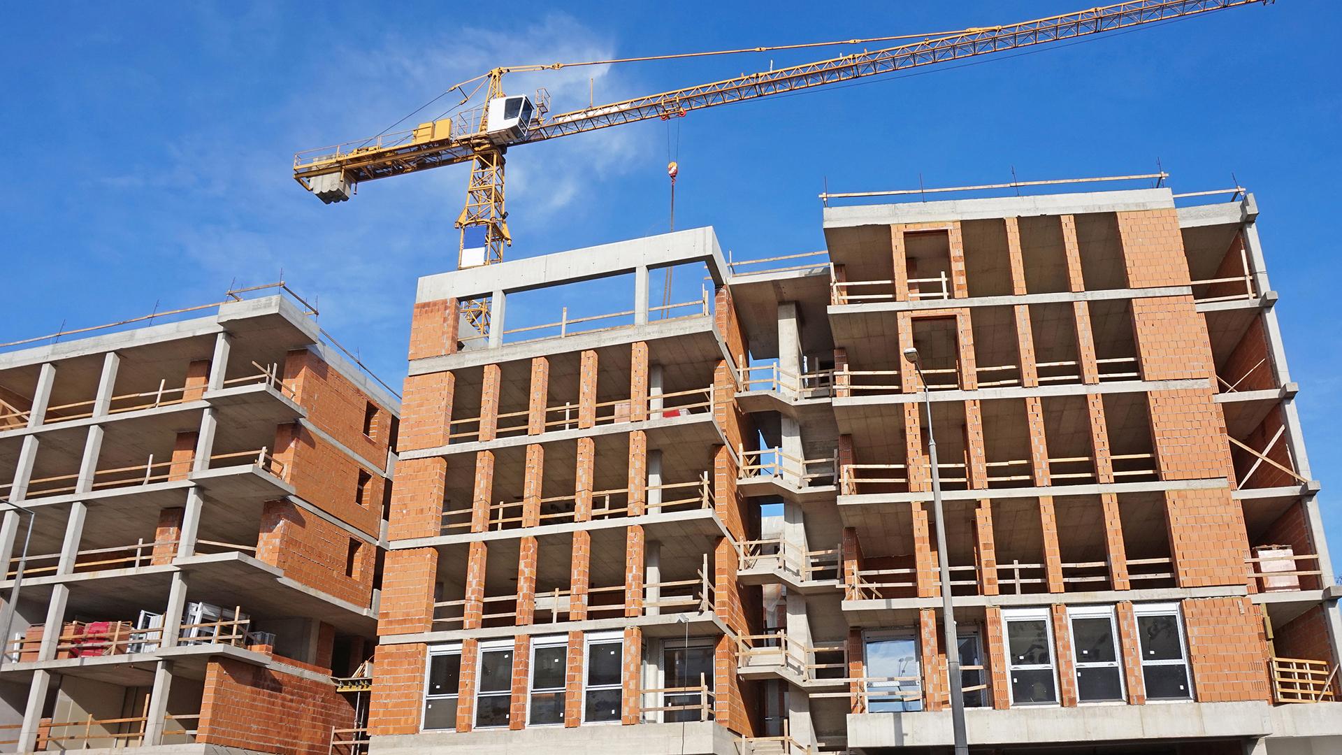 A construction site of a new apartment building in a city