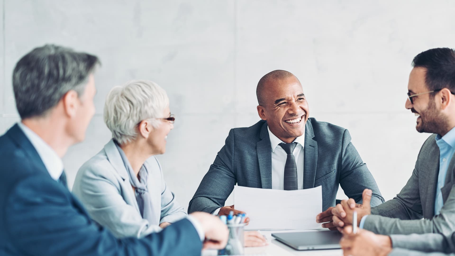 group of business persons having a meeting.