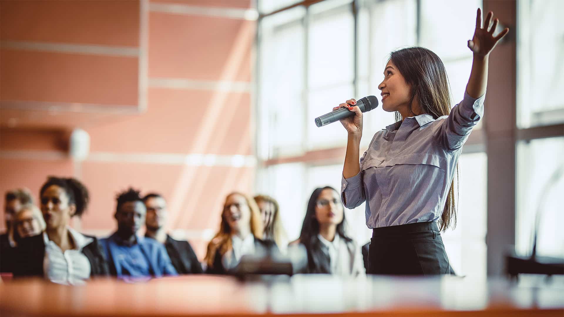 Business People Listening to a Public Speaker