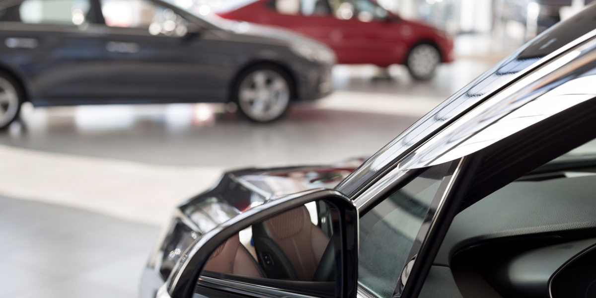 Black car at a dealership