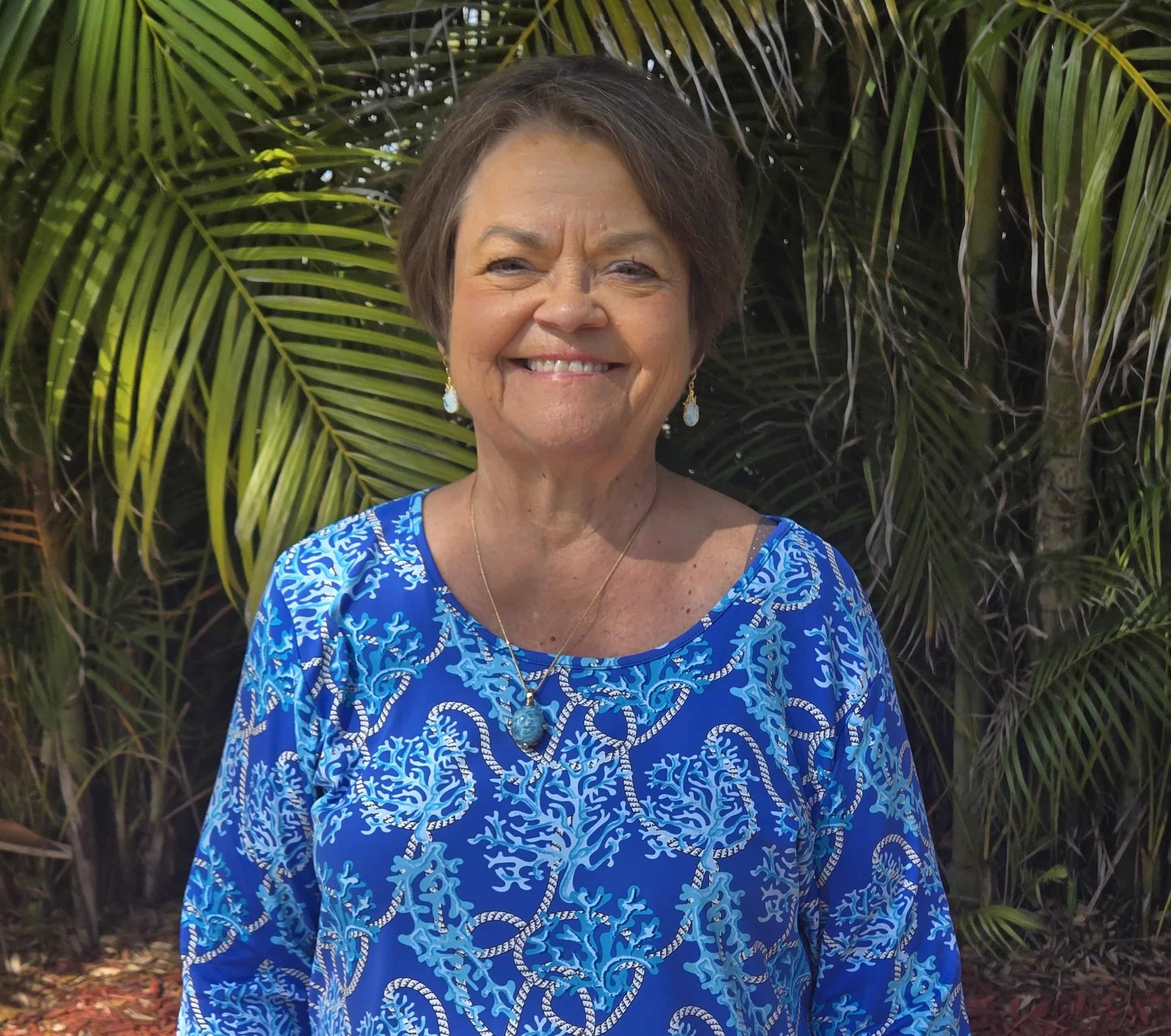 Judy smiling on vacation.