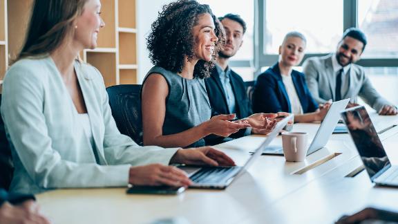 Group of business persons in business meeting. Group of entrepreneurs on meeting in board room. Corporate business team on meeting in the office.