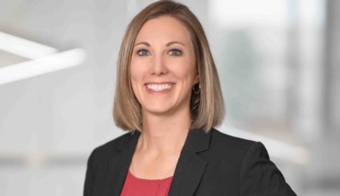 Kim keller posing for her headshot.