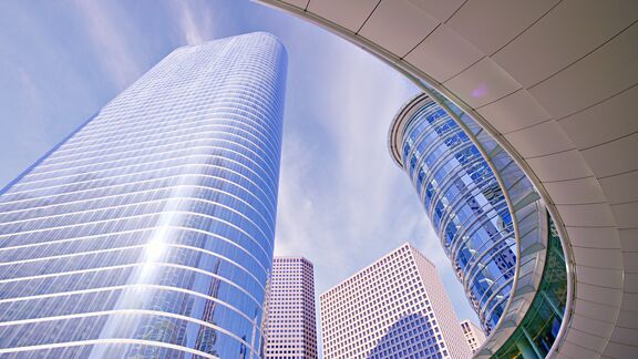 High rises in a financial district of a city during dusk.