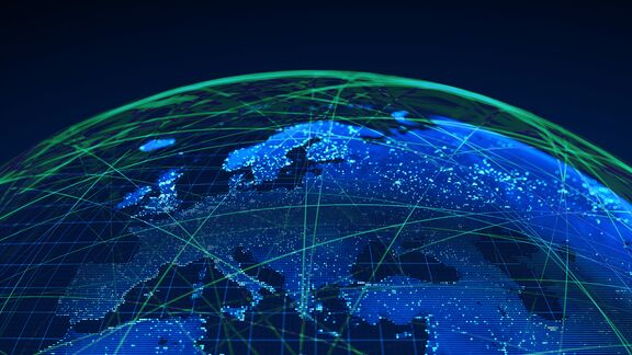 A 3D render of planet Earth showing a global communication network with red lines.