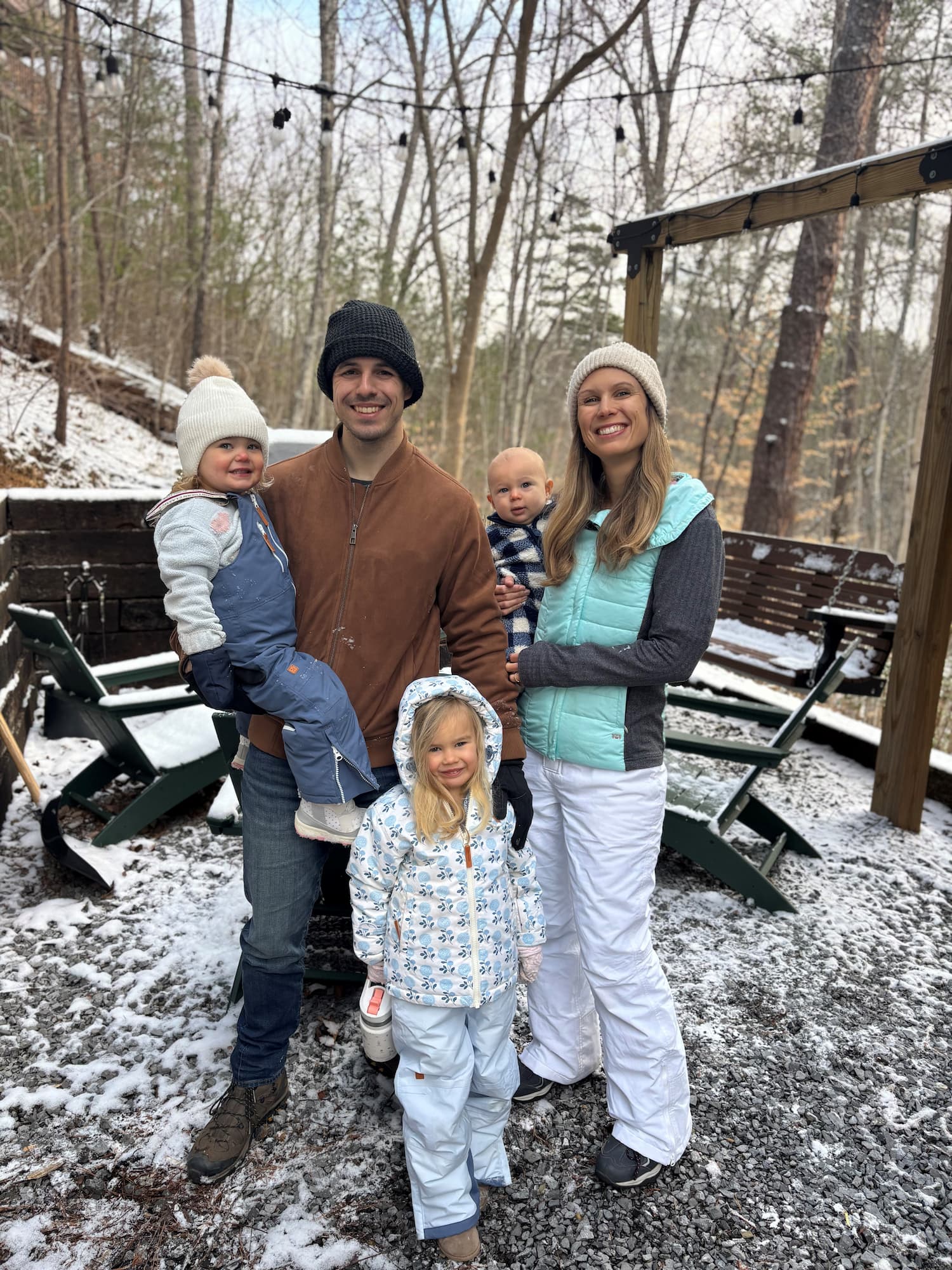 Patrick and his family outside during the winter.