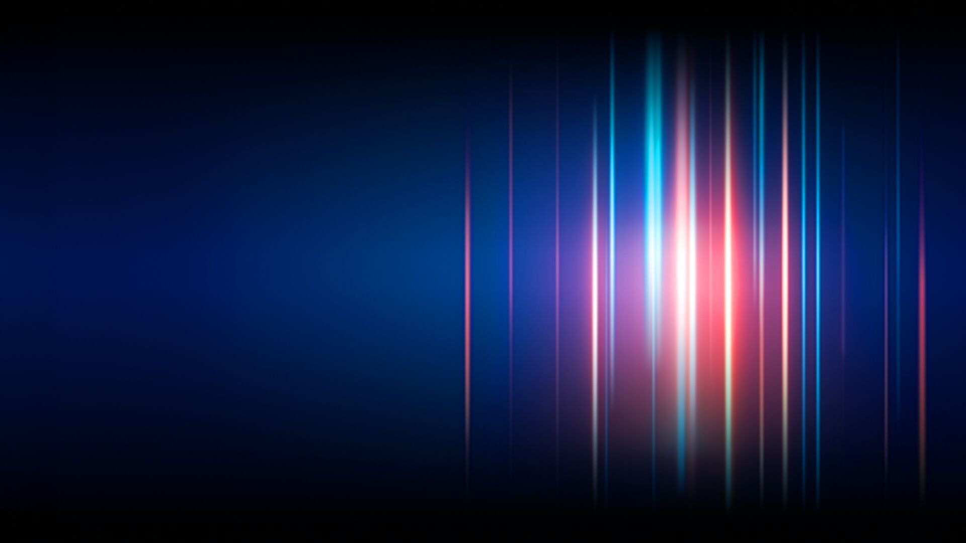 Gradient shades of red and blue on a dark blue backgroudn.
