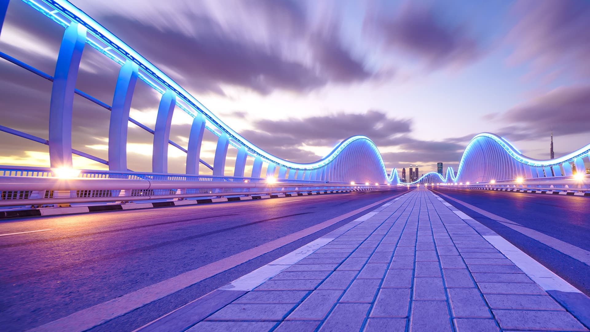 The Meydan Bridge in Dubai at nighttime