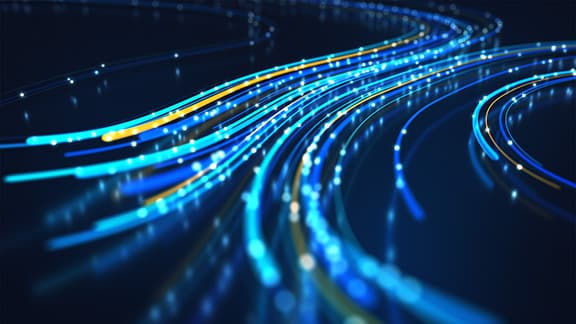 Network data that is flowing and glowing yellow and blue colors and with a black background