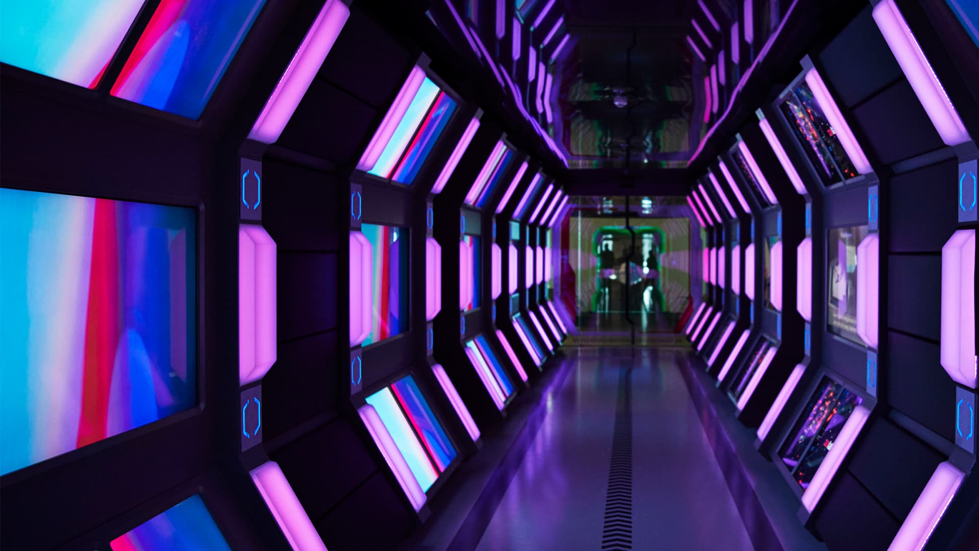 The interior of a futuristic looking hallway in a modern office building