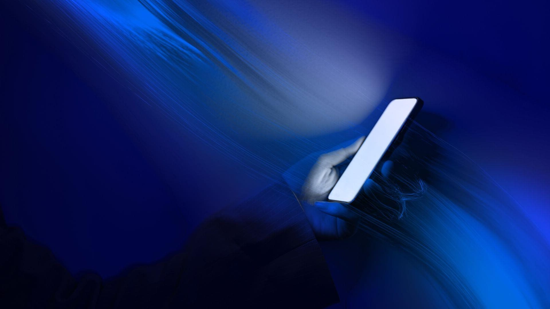 Close up of a person looking at their smart phone.