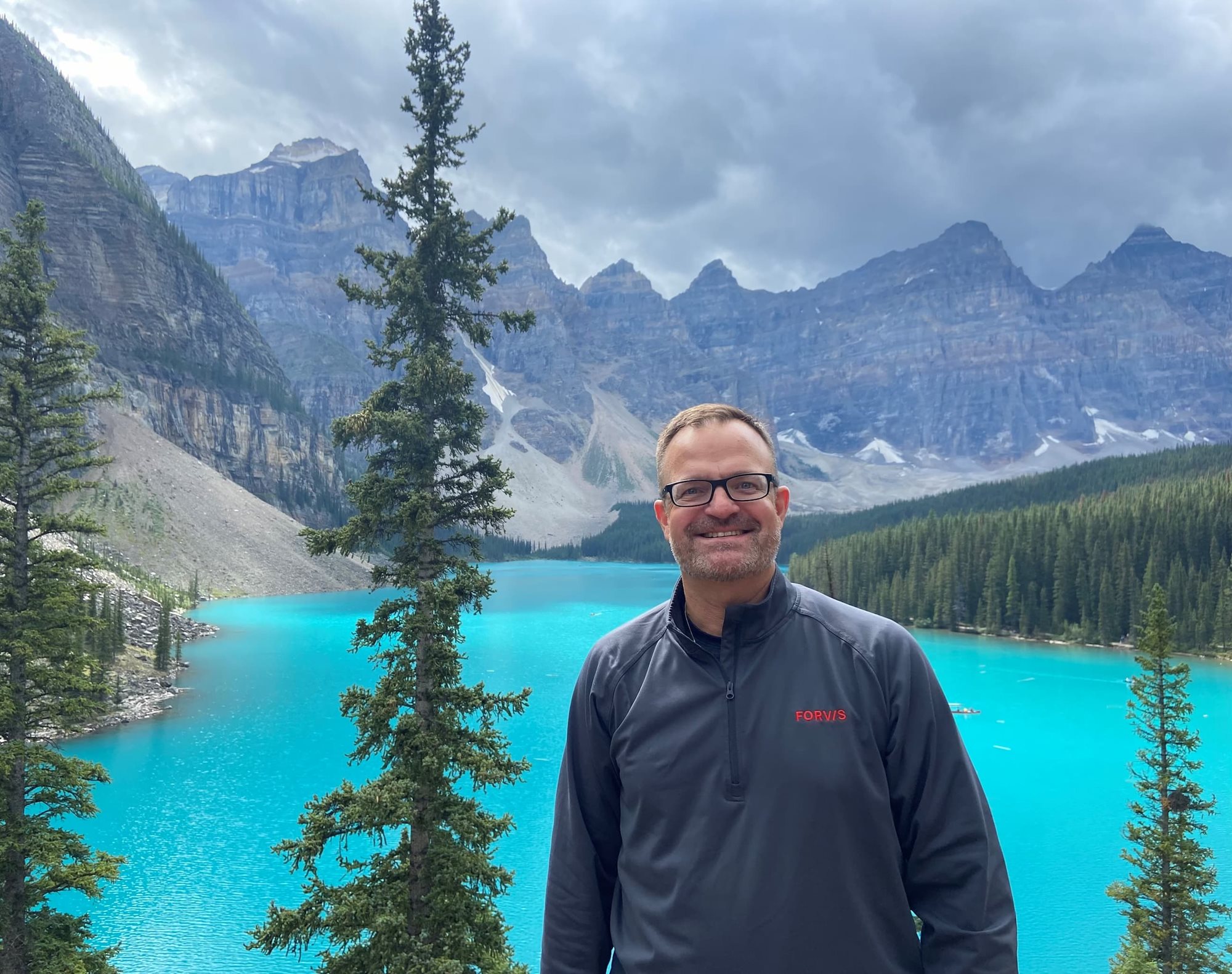 Ed smiling in Banff, Canada.