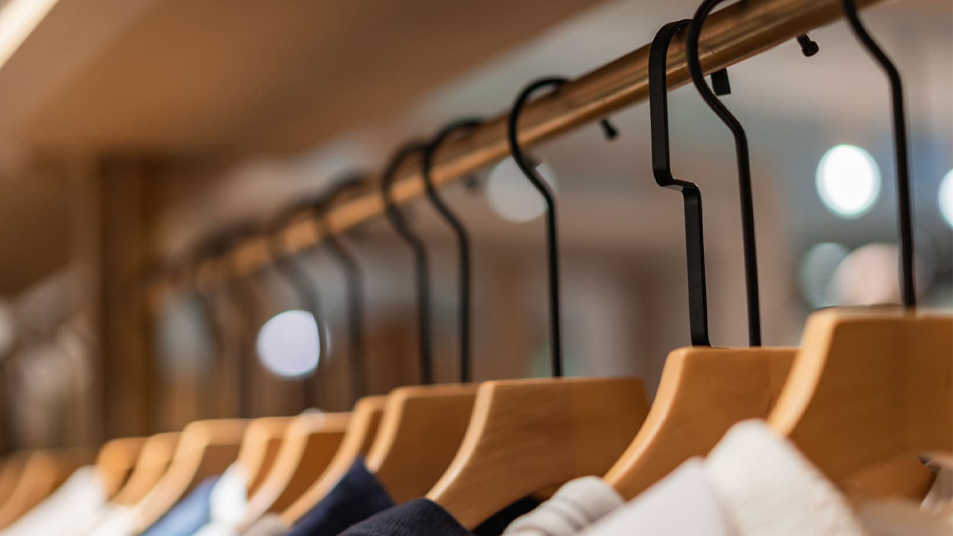 A woman doing some window shopping in a metro area.