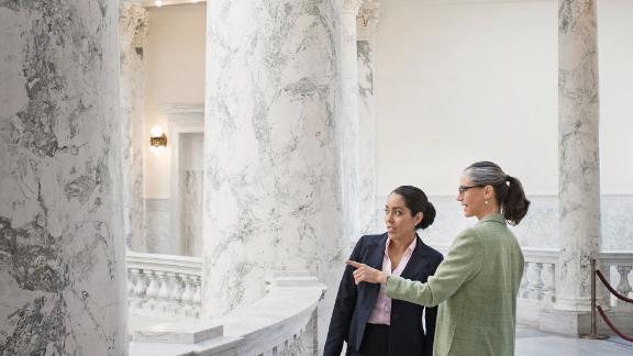 Politicians talking in government building