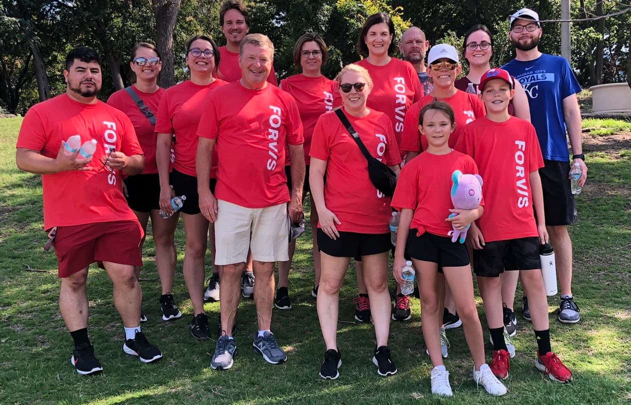 Bill pickert with a group of coworkers at Forvis, volunteering for the day.