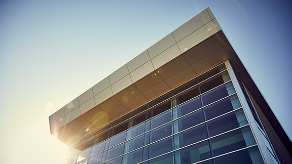 The exterior of a modern hospital.