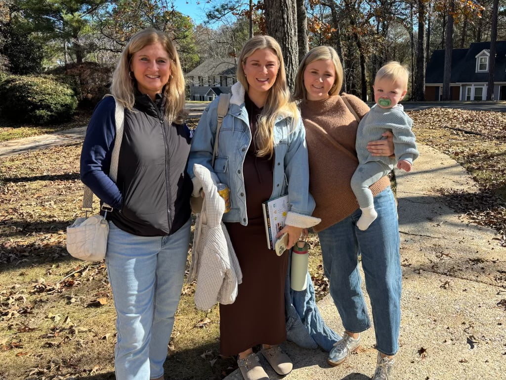 Lori Haley posing with her family.