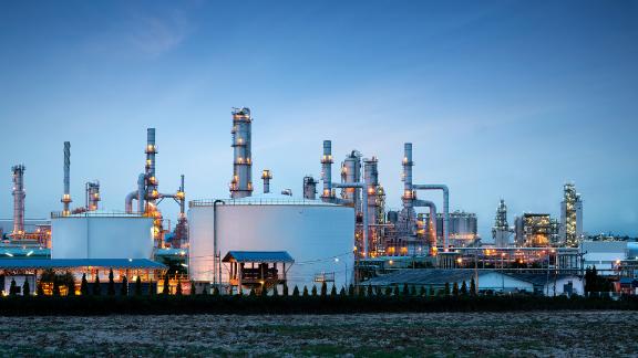 A petrochemical industry plant with a blue sky in the background.