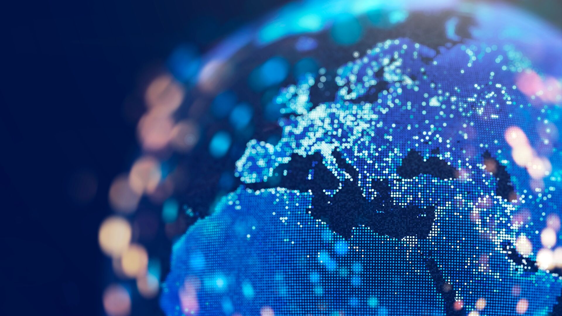 A dotted earth with lights bokeh on a dark blue background.