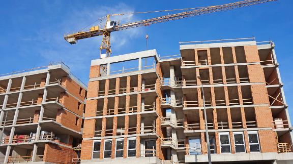 A construction site of a new apartment building in a city