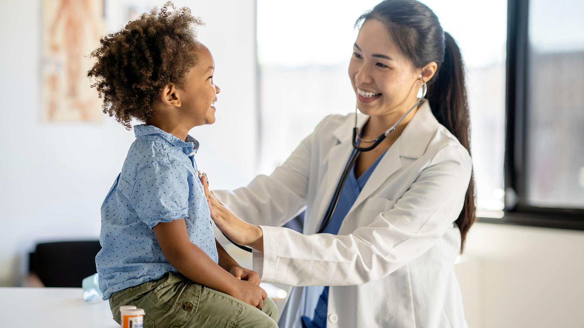 Healthcare Worker Smiling at Patient